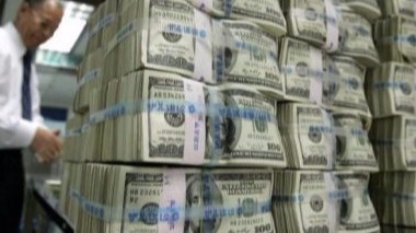 1 млрд. долларов в сутки Латвия платит дань США